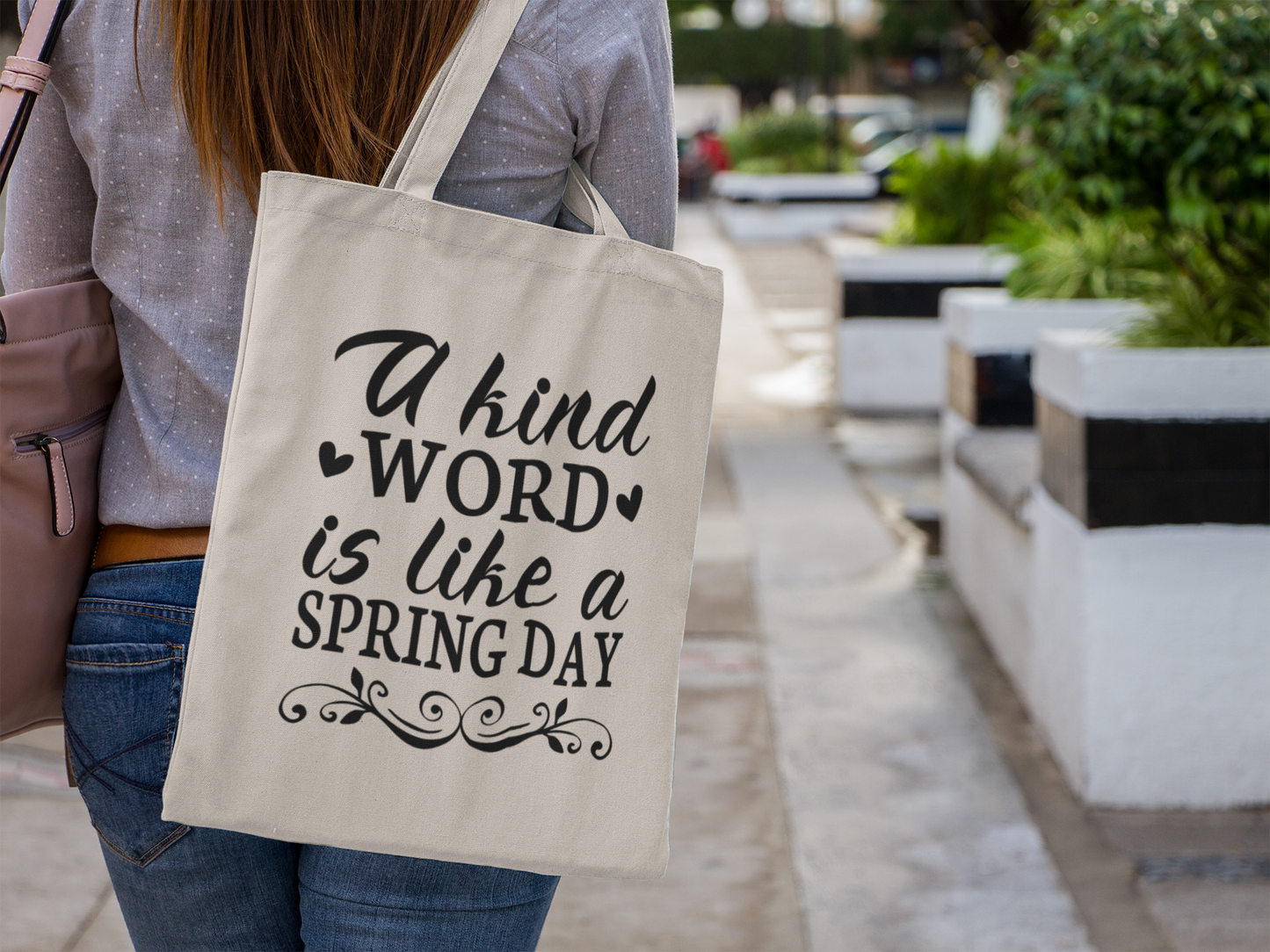 "A kind word is like a spring day" Tote Bag